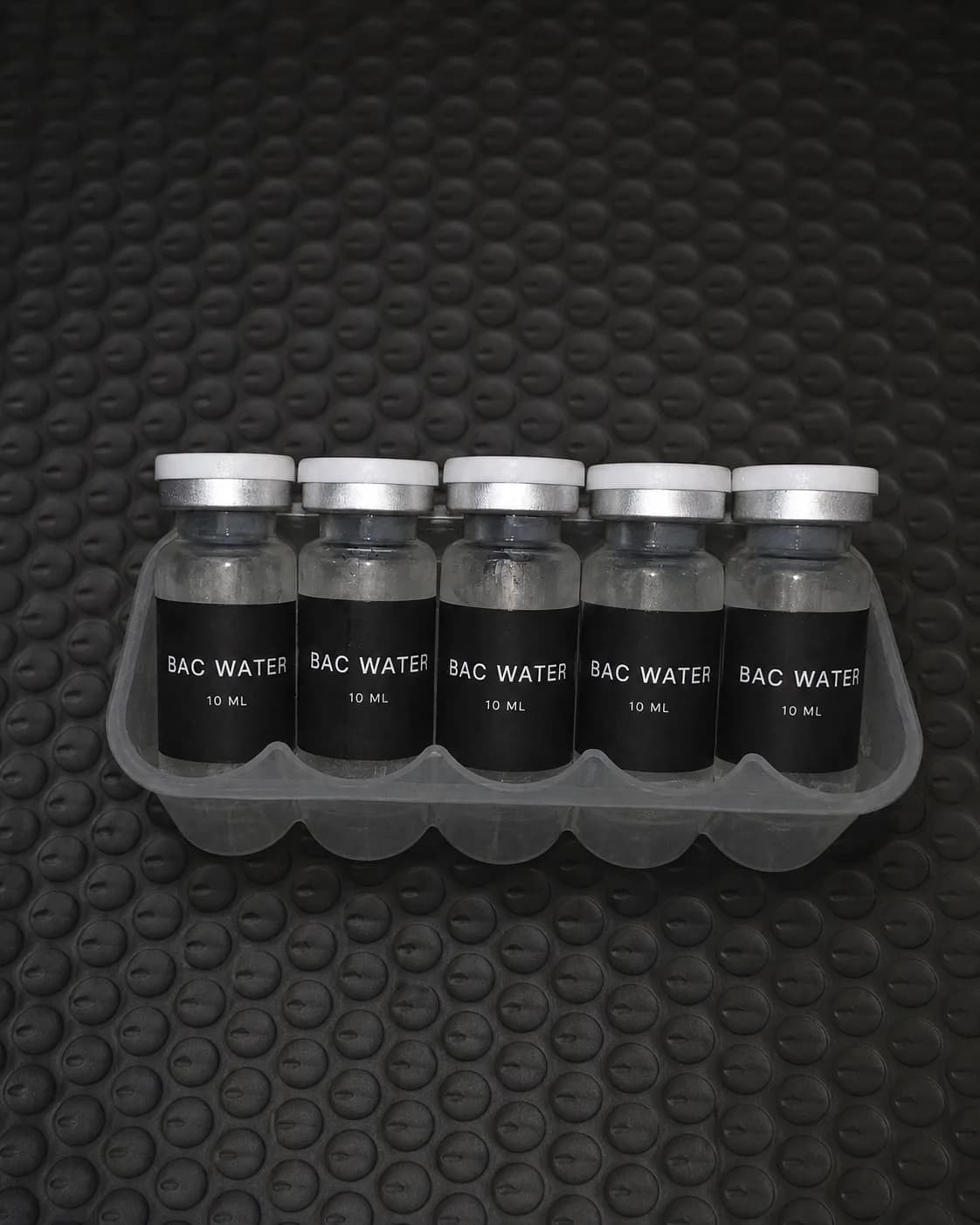 Five 10ml BAC Water vials ready for local delivery in Thailand